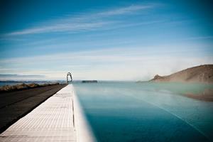 Hofsós thermal pool by sea shore with spectacular view over Skagafjörður bay - North