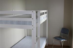 bunk bed in a separate room.