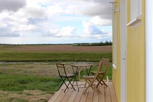 Each unit cottage has its own veranda where you can enjoy a beautiful view of the countryside