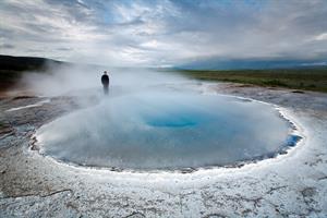 Visit the Geysir hot spring area in South Iceland.